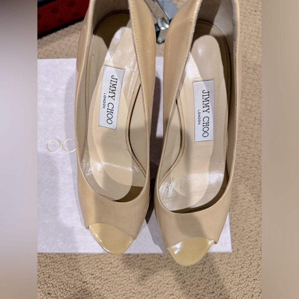 Jimmy Choo
Patent Leather Pumps